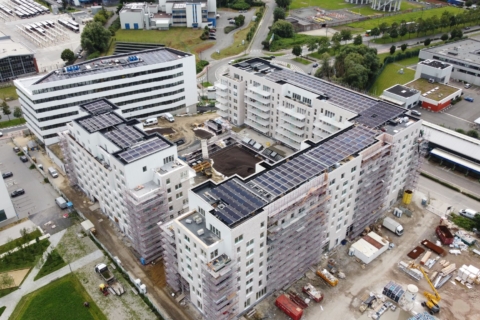 installation solaire au City Dox d'Anderlecht : immeubles résidentiels modernes, bureaux et espaces commerciaux et de soins